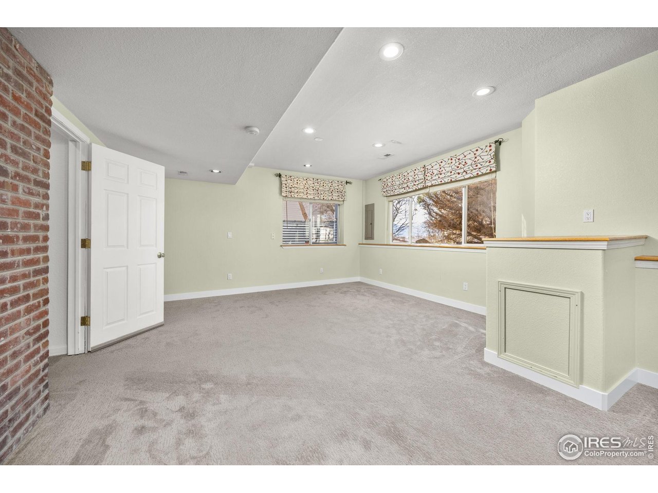 6644 Drew Ranch Lane Boulder, CO 80301 - Photo 26 of 45 a view of an empty room with a window