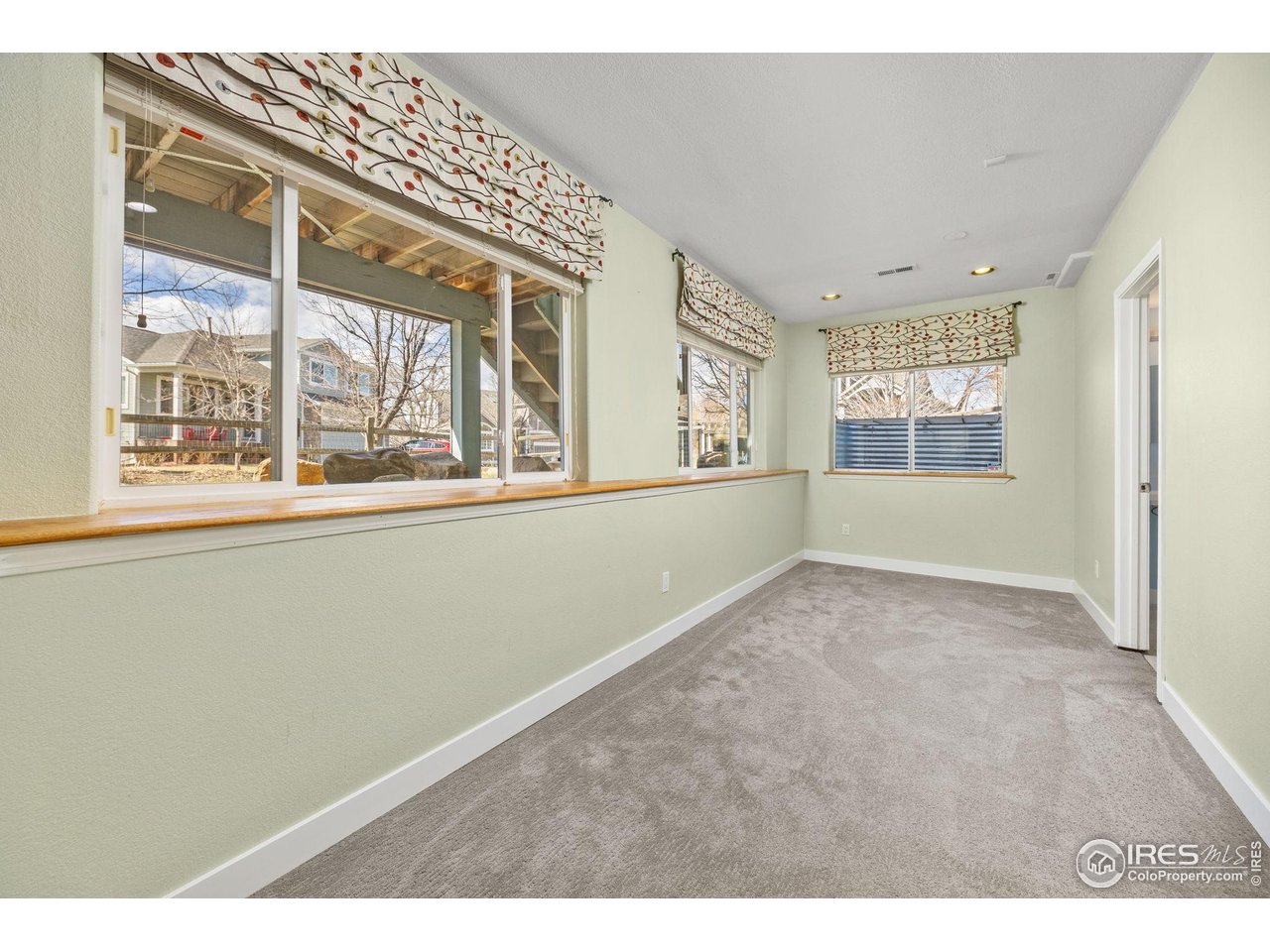 6644 Drew Ranch Lane Boulder, CO 80301 - Photo 27 of 45 a view of an empty room with a window