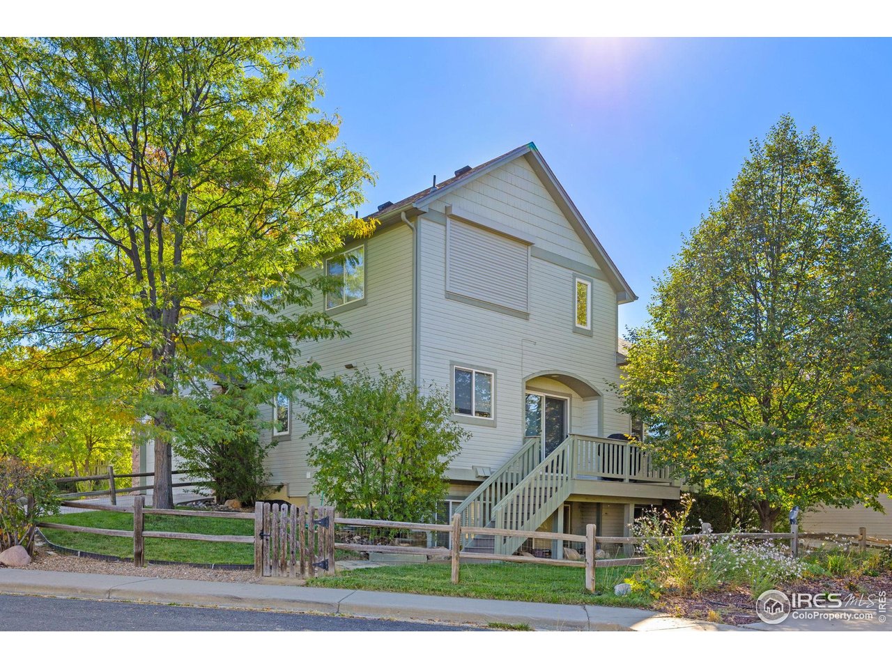 6644 Drew Ranch Lane Boulder, CO 80301 - Photo 36 of 45 a front view of a house with garden