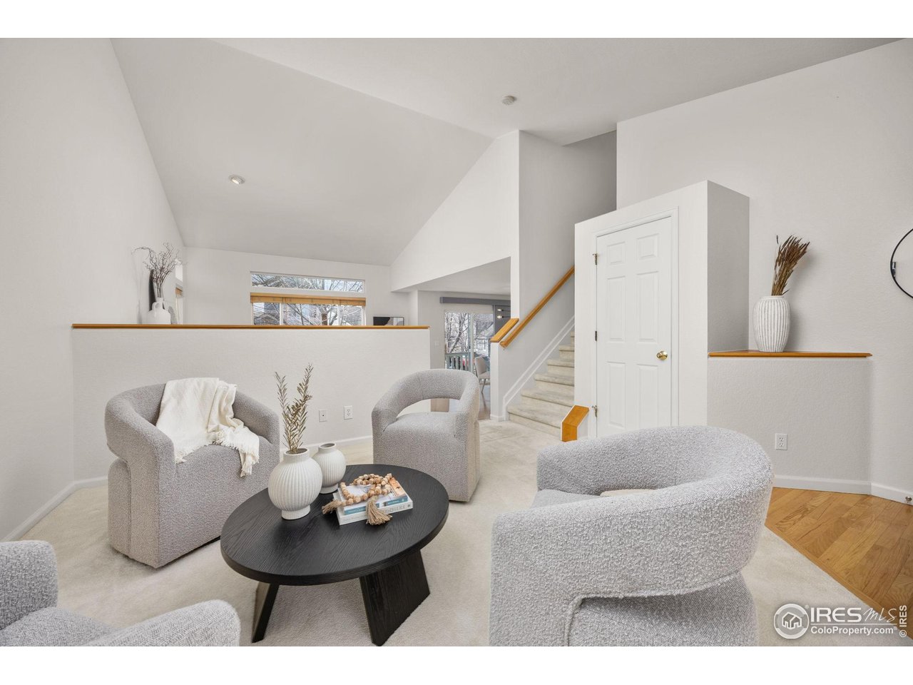 6644 Drew Ranch Lane Boulder, CO 80301 - Photo 6 of 45 a living room with furniture and kitchen view