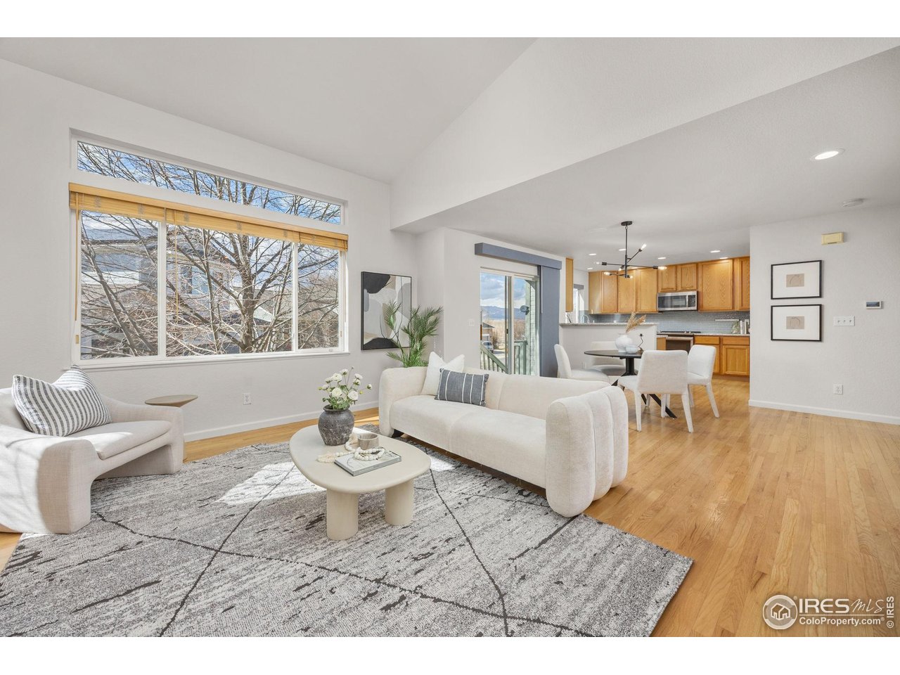 6644 Drew Ranch Lane Boulder, CO 80301 - Photo 10 of 45 a living room with furniture and a large window