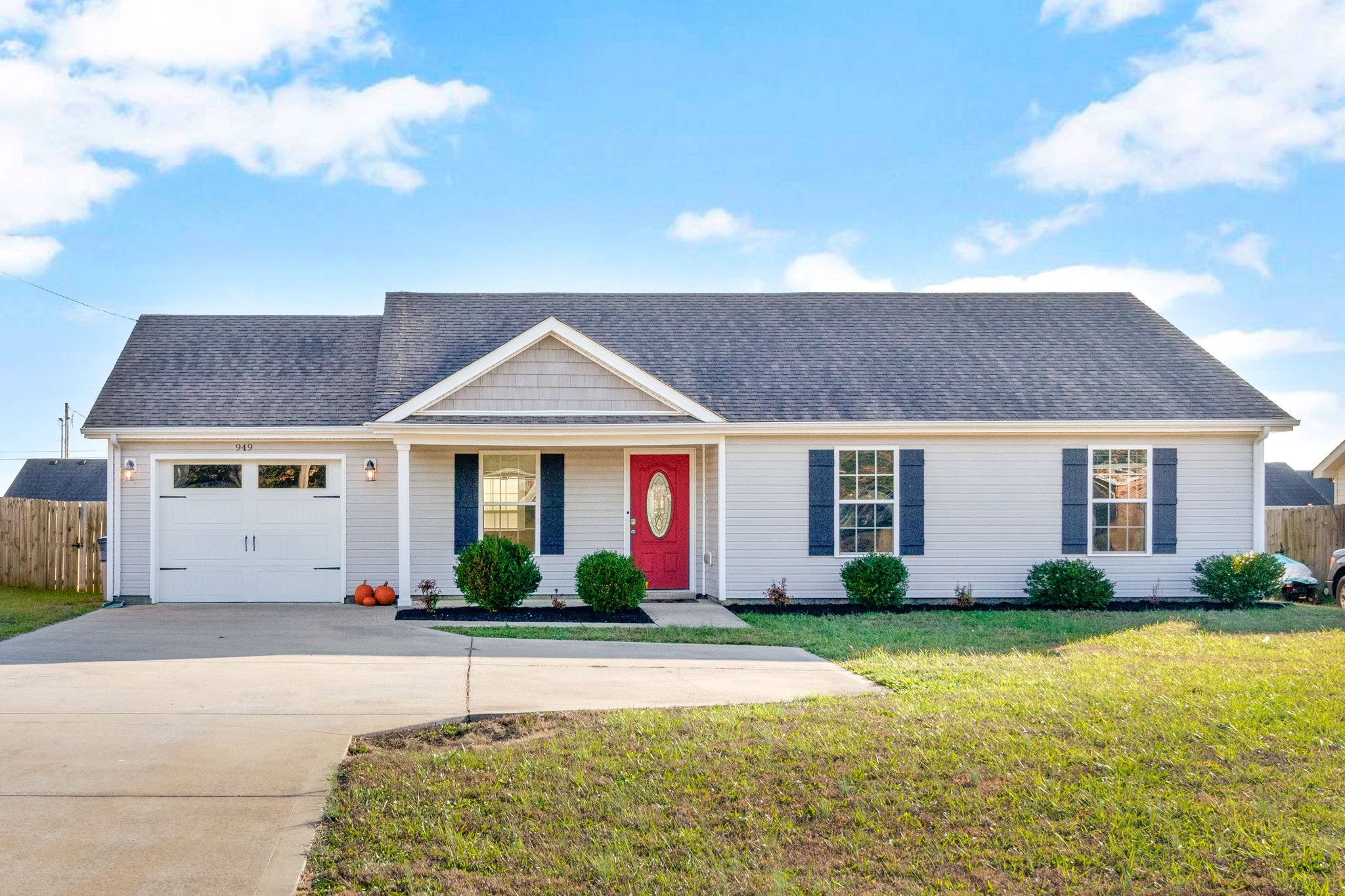 949 Hugh Hunter Road Oak Grove, KY 42262 - Photo 1 of 21 a front view of a house with garden