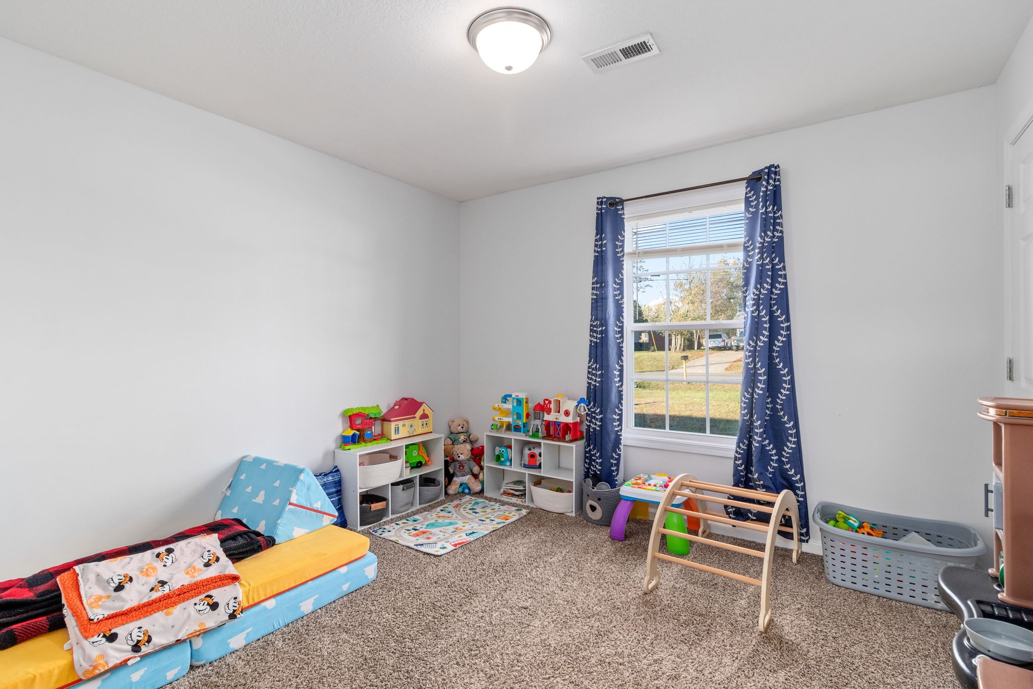949 Hugh Hunter Road Oak Grove, KY 42262 - Photo 16 of 21 a children room with toys and a tv