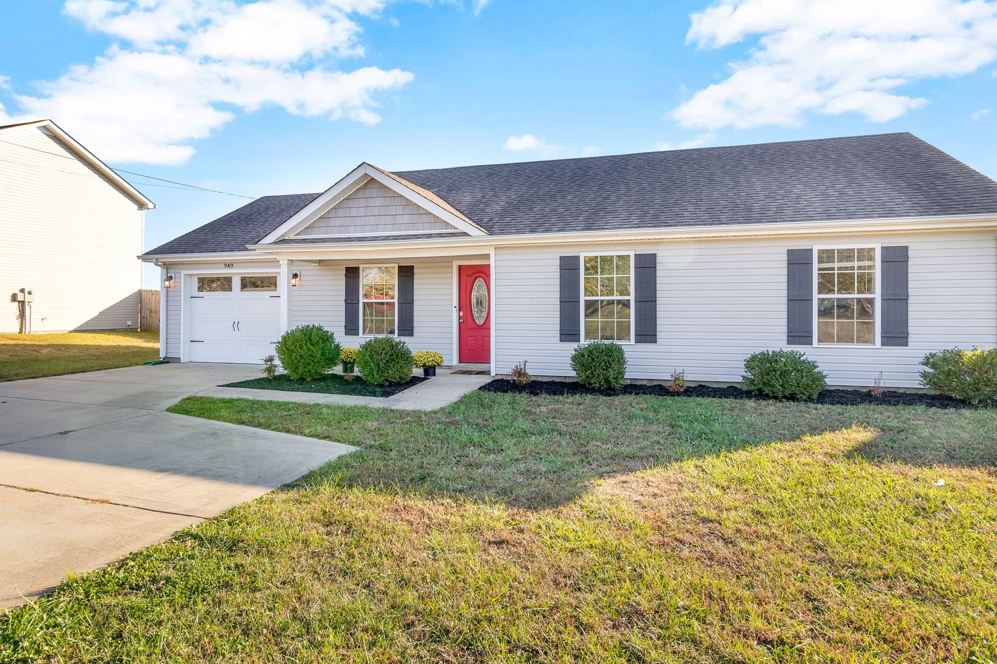 949 Hugh Hunter Road Oak Grove, KY 42262 - Photo 2 of 21 a front view of a house with a yard and garage