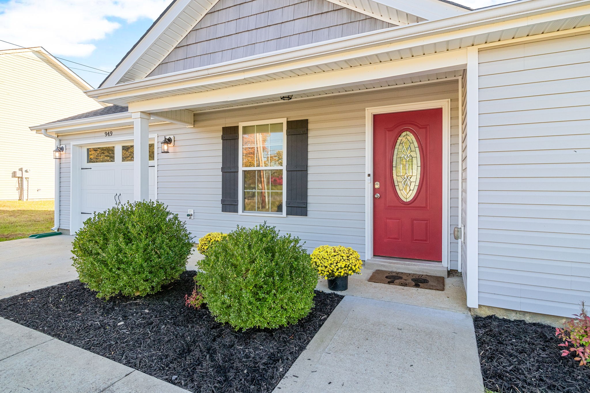 949 Hugh Hunter Road Oak Grove, KY 42262 - Photo 3 of 21 a view of a small house with potted plants