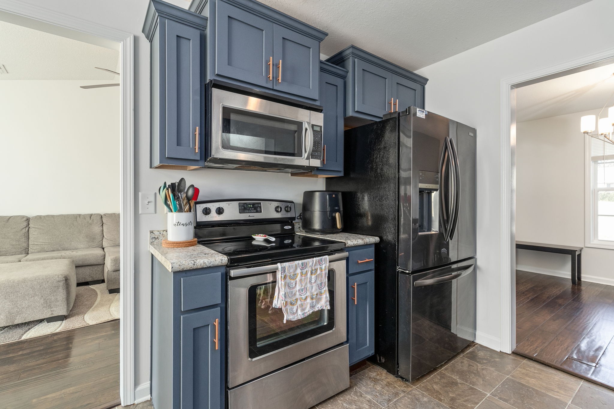 949 Hugh Hunter Road Oak Grove, KY 42262 - Photo 9 of 21 a kitchen with stainless steel appliances granite countertop a refrigerator stove and microwave