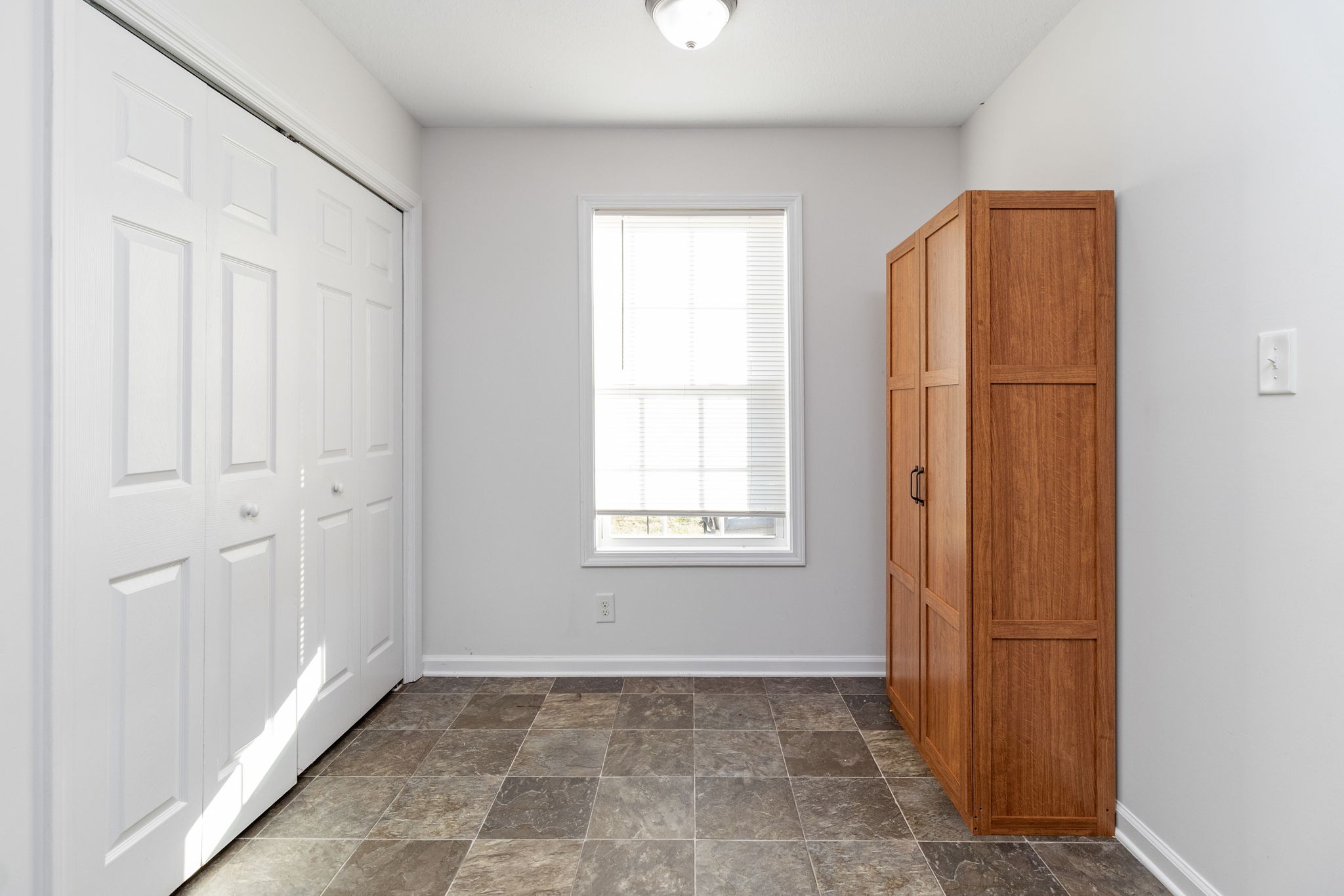 949 Hugh Hunter Road Oak Grove, KY 42262 - Photo 10 of 21 a view of an empty room with window and closet area