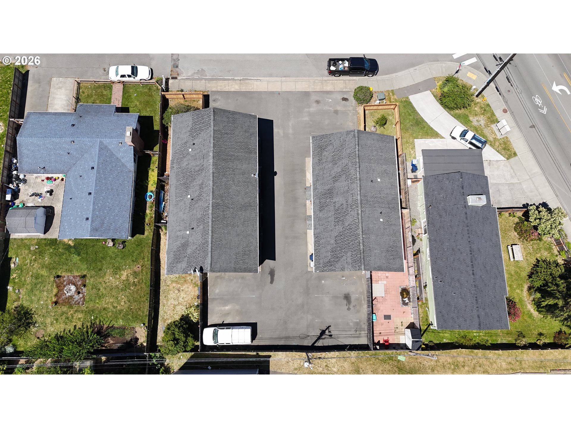 325 Matot Street, Unit B Brookings, OR 97415 - Photo 27 of 28 an aerial view of multiple houses with a yard