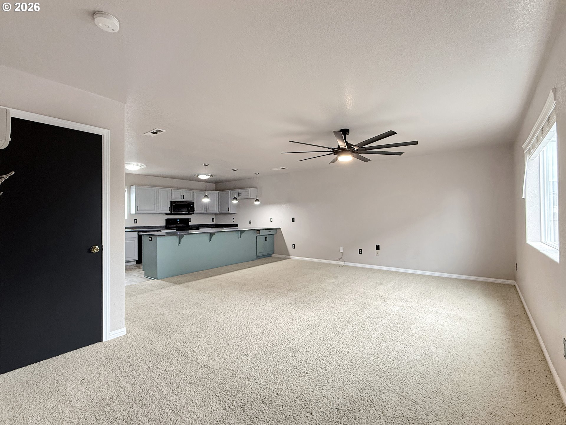 325 Matot Street, Unit B Brookings, OR 97415 - Photo 4 of 28 a view of a kitchen with a sink and a kitchen view