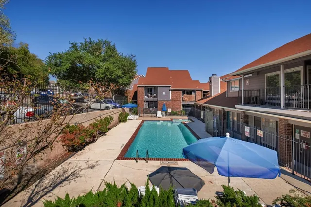 a view of an outdoor space with swimming pool