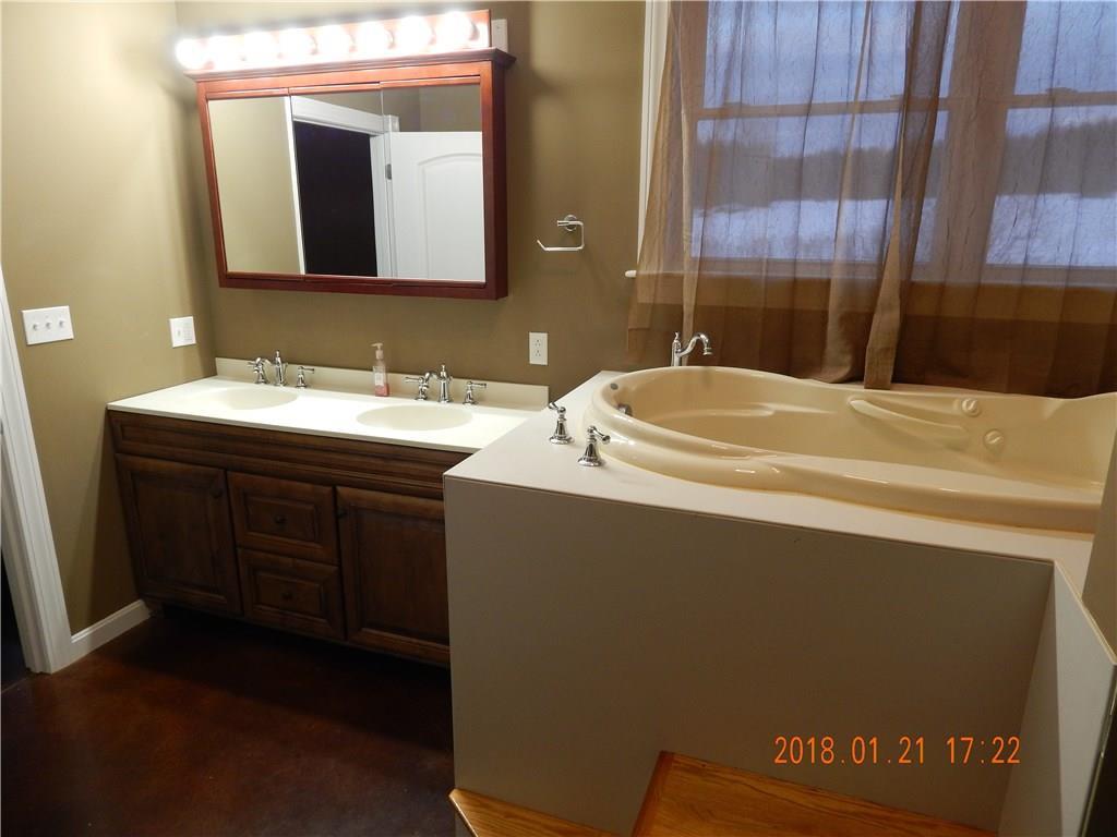 220 Potter Road Hudson, ME 04449 - Photo 16 of 35 Dual Sinks and Jetted Tub in Master...