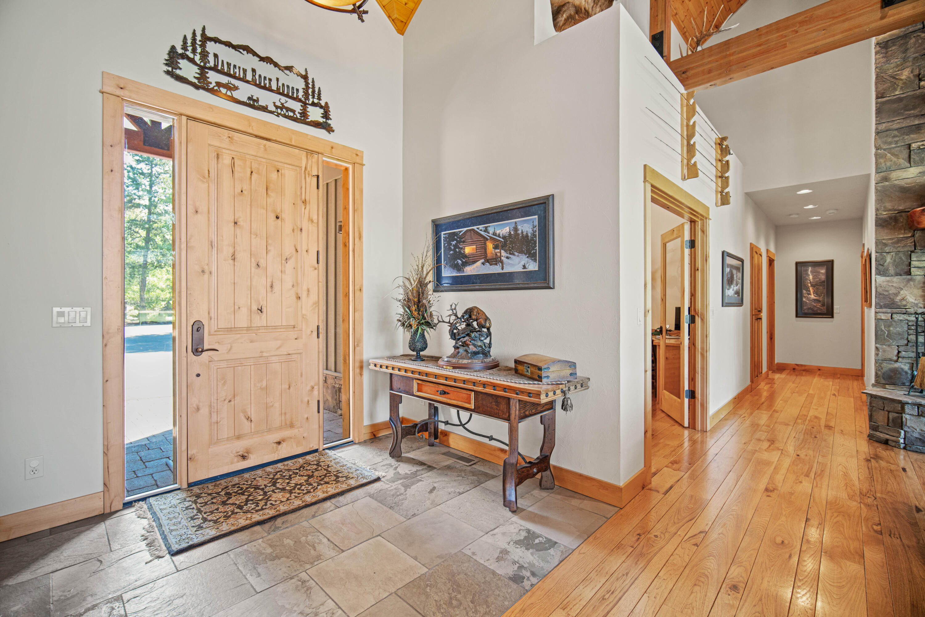 56689 Dancing Rock Loop Bend, OR 97707 - Photo 18 of 51 a view of a hallway with workspace and a window