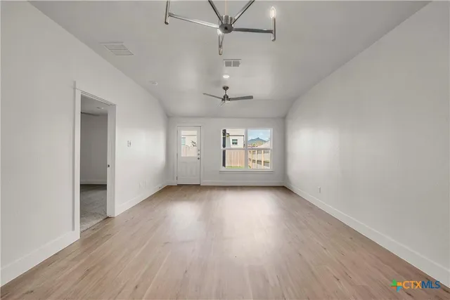 an empty room with a window