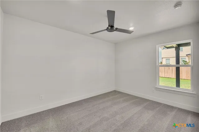 a bathroom with a granite countertop sink a toilet and bathtub