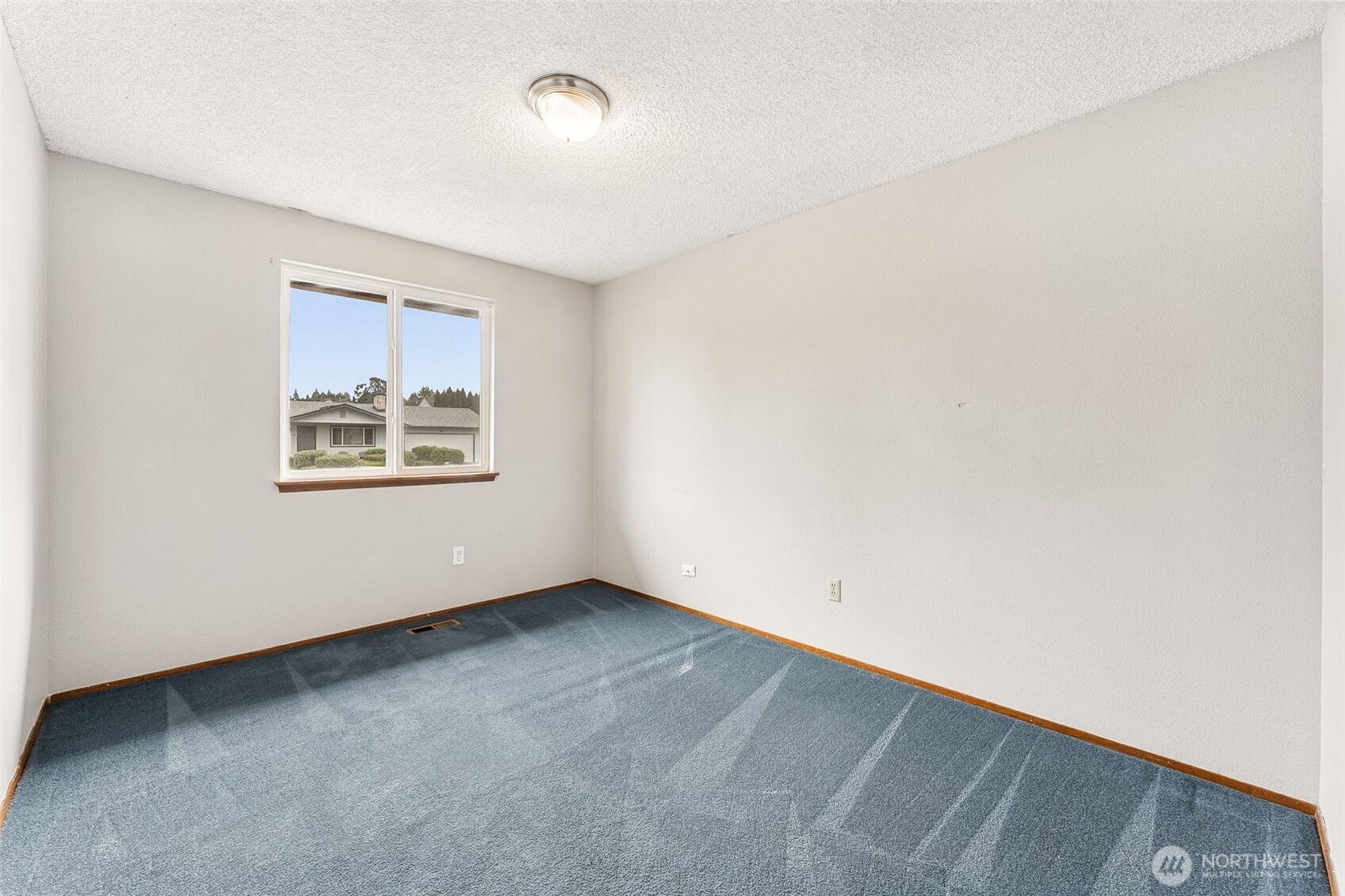 10014 108th Avenue Southwest Tacoma, WA 98498 - Photo 16 of 39 an empty room with windows