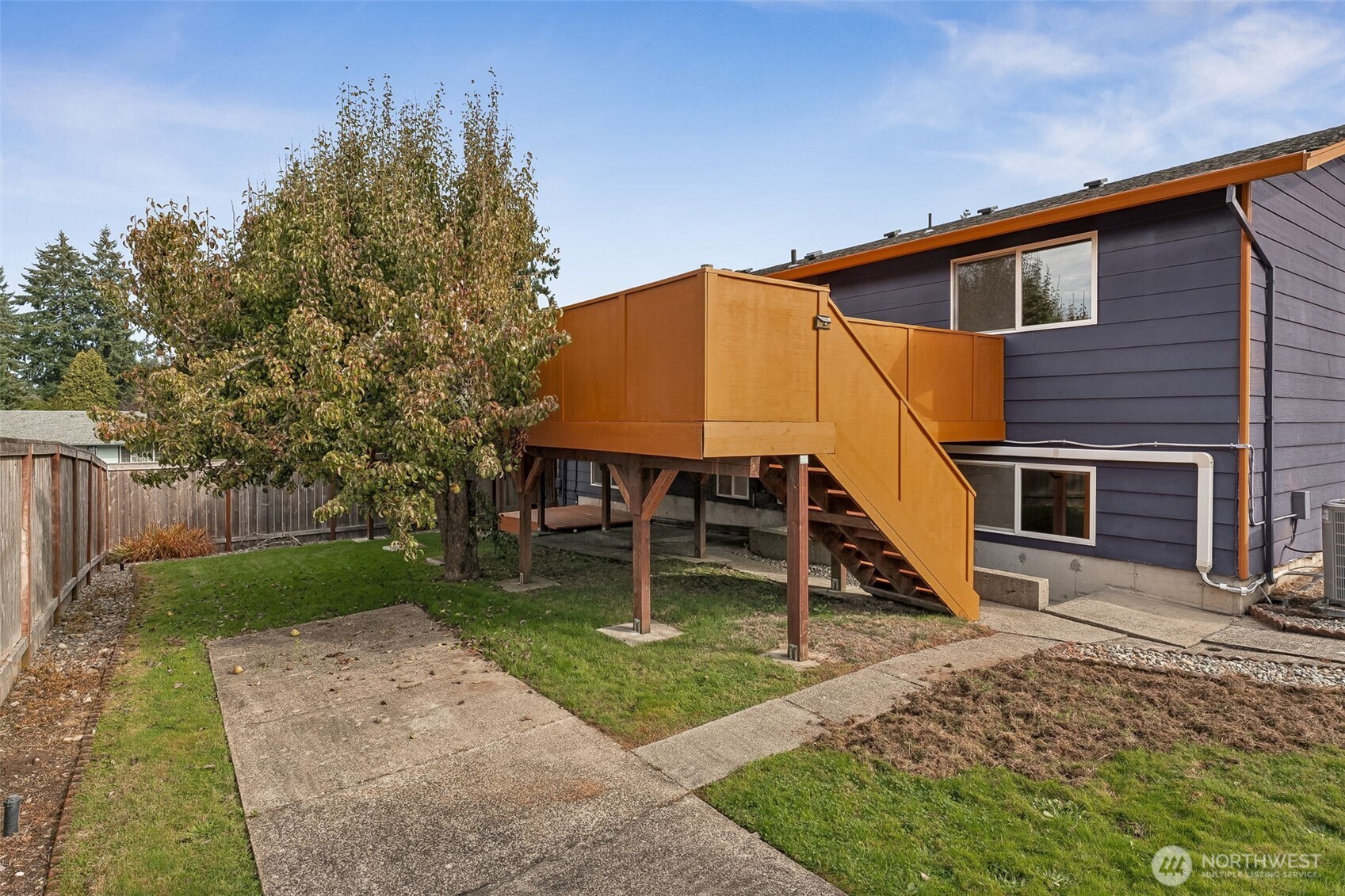 10014 108th Avenue Southwest Tacoma, WA 98498 - Photo 25 of 39 a backyard of a house with table and chairs