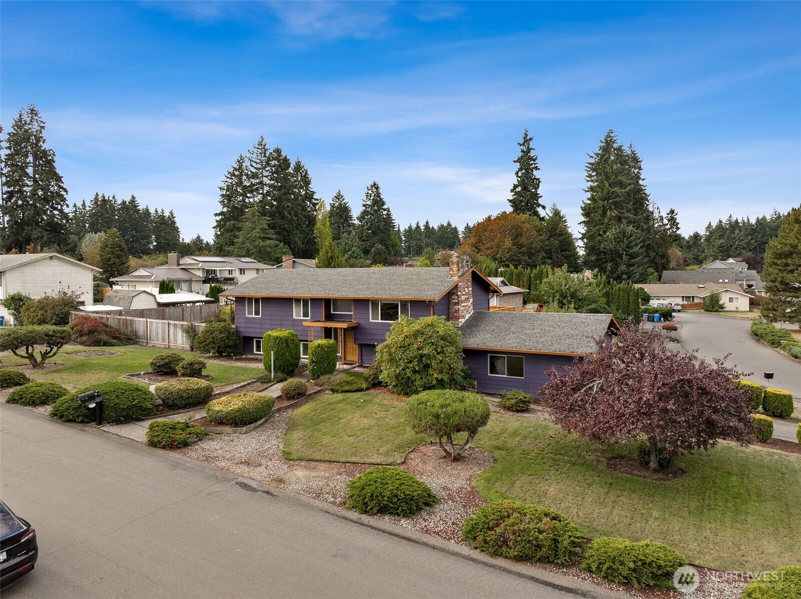 10014 108th Avenue Southwest Tacoma, WA 98498 - Photo 3 of 39 a view of a house with garden space and sitting area