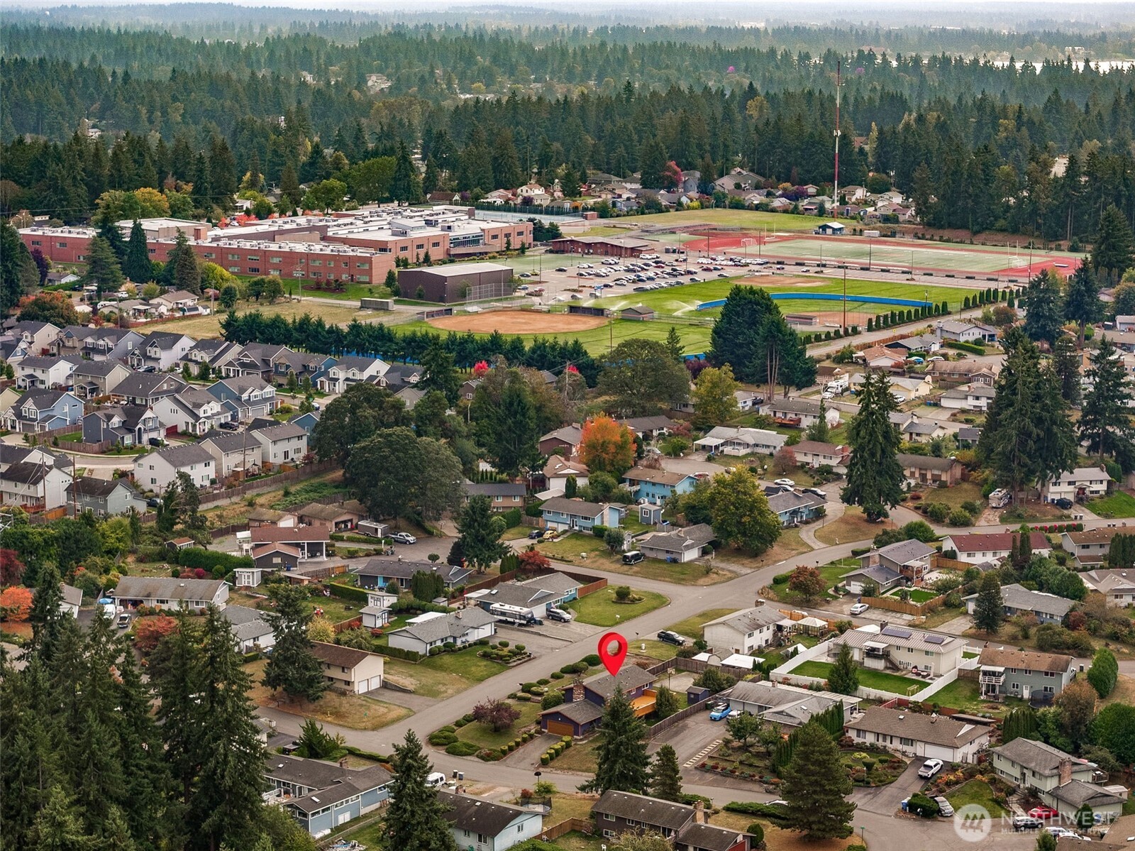 10014 108th Avenue Southwest Tacoma, WA 98498 - Photo 36 of 39 a view of swimming pool with a table and chairs