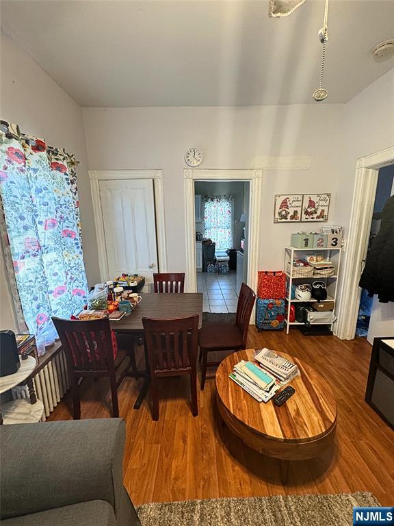 72 Lawrence Street Hackensack, NJ 07601 - Photo 5 of 11 a living room with furniture a rug and a flat screen tv