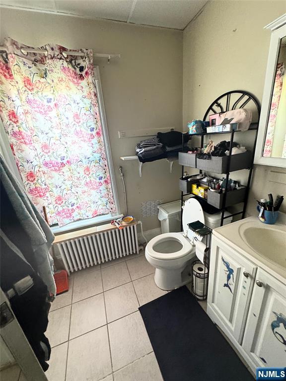 72 Lawrence Street Hackensack, NJ 07601 - Photo 8 of 11 a bathroom with a sink toilet and shower