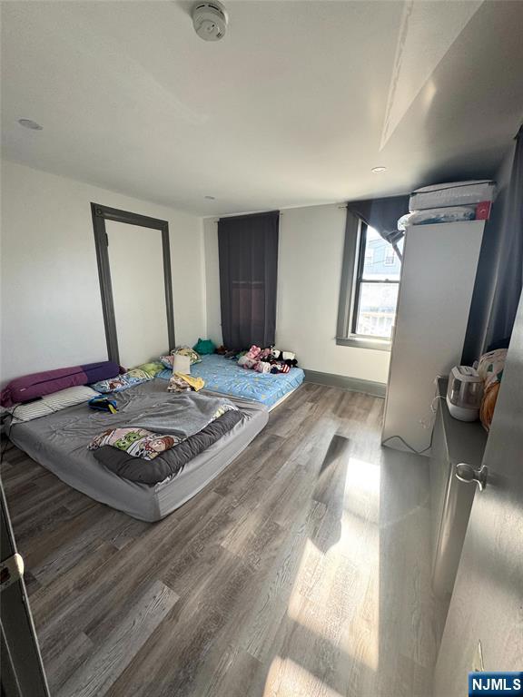 72 Lawrence Street Hackensack, NJ 07601 - Photo 9 of 11 a living room with couch window and a table