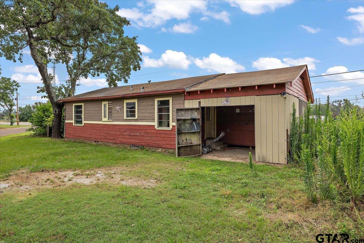 1535 North Dickinson Drive Rusk, TX 75785 - Photo 12 of 18 a view of a house with a backyard