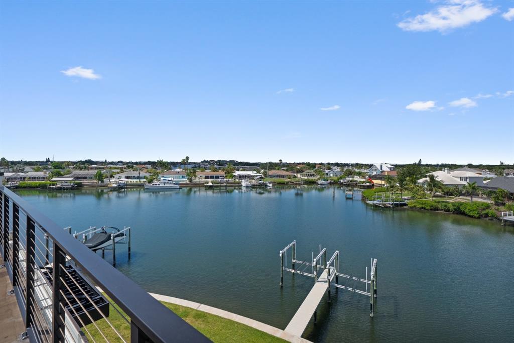 775 Gran Kaymen Way Apollo Beach, FL 33572 - Photo 29 of 43 a view of a lake with a outdoor space