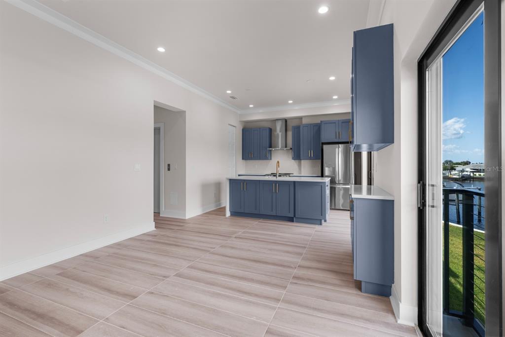 775 Gran Kaymen Way Apollo Beach, FL 33572 - Photo 32 of 43 a view of kitchen with wooden floor