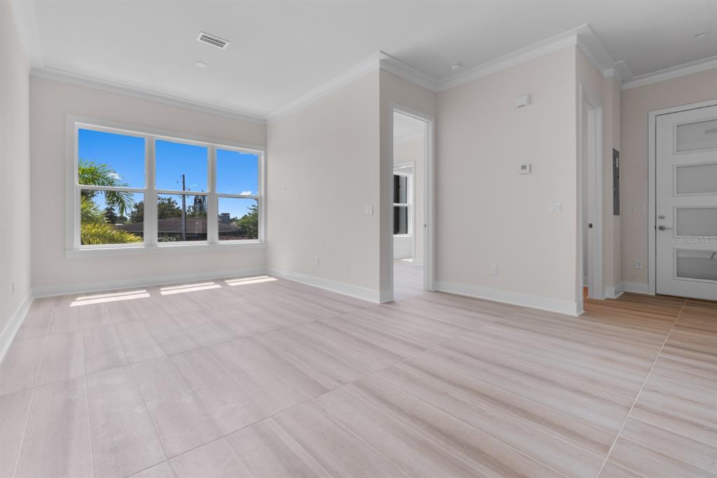 775 Gran Kaymen Way Apollo Beach, FL 33572 - Photo 5 of 43 a view of a kitchen with a sink and a window