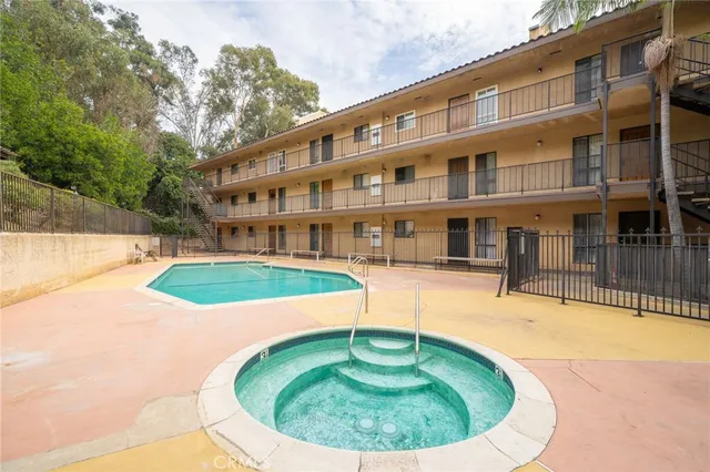 a view of a house with swimming pool