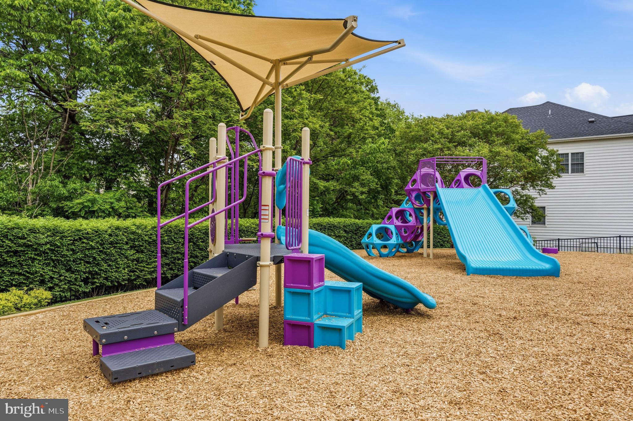 25154 Monteith Terrace Chantilly, VA 20152 - Photo 32 of 40 a view of playground with a small pool