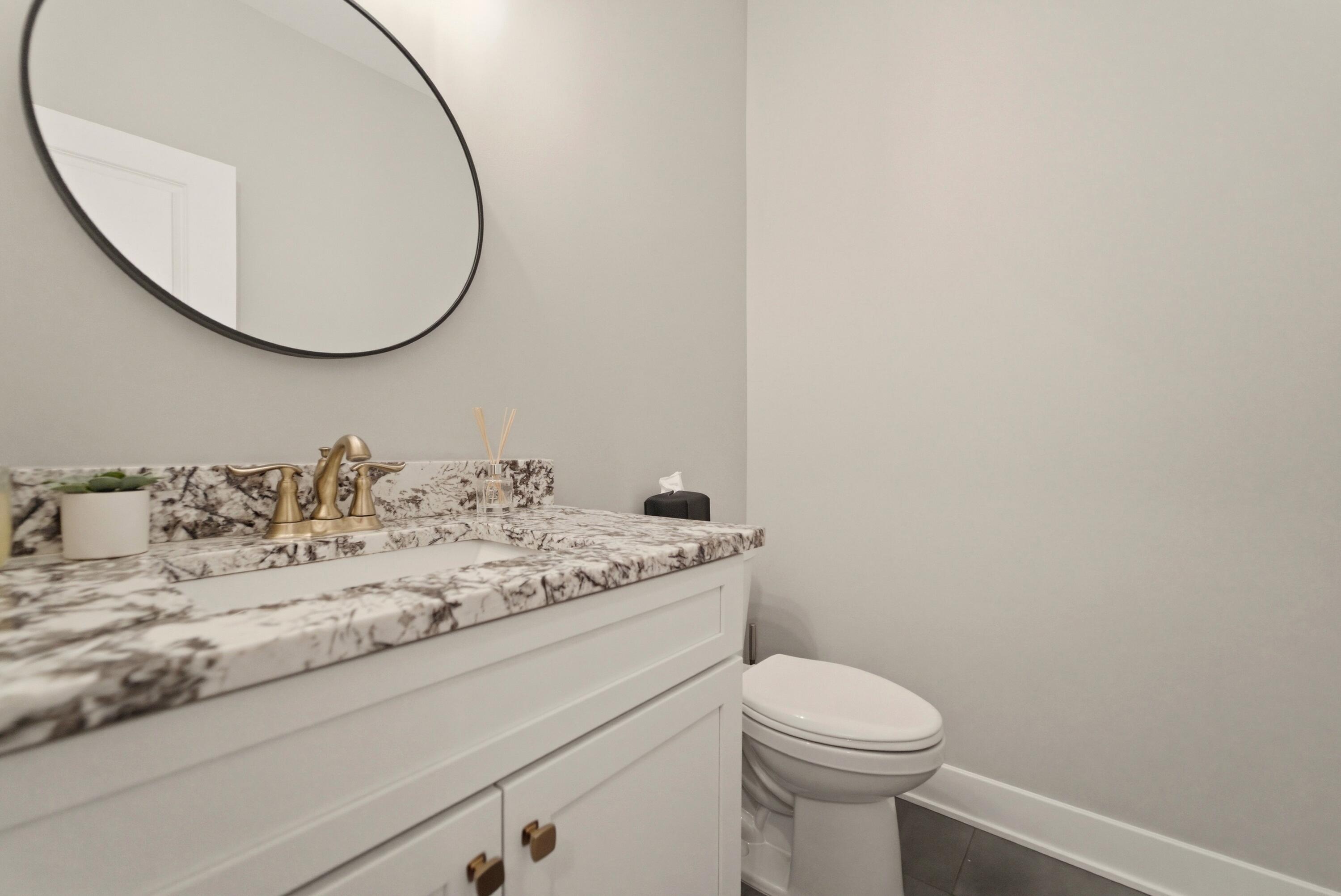 11200 Oak Ridge Court Crown Point, IN 46307 - Photo 22 of 43 a bathroom with a sink and a toilet