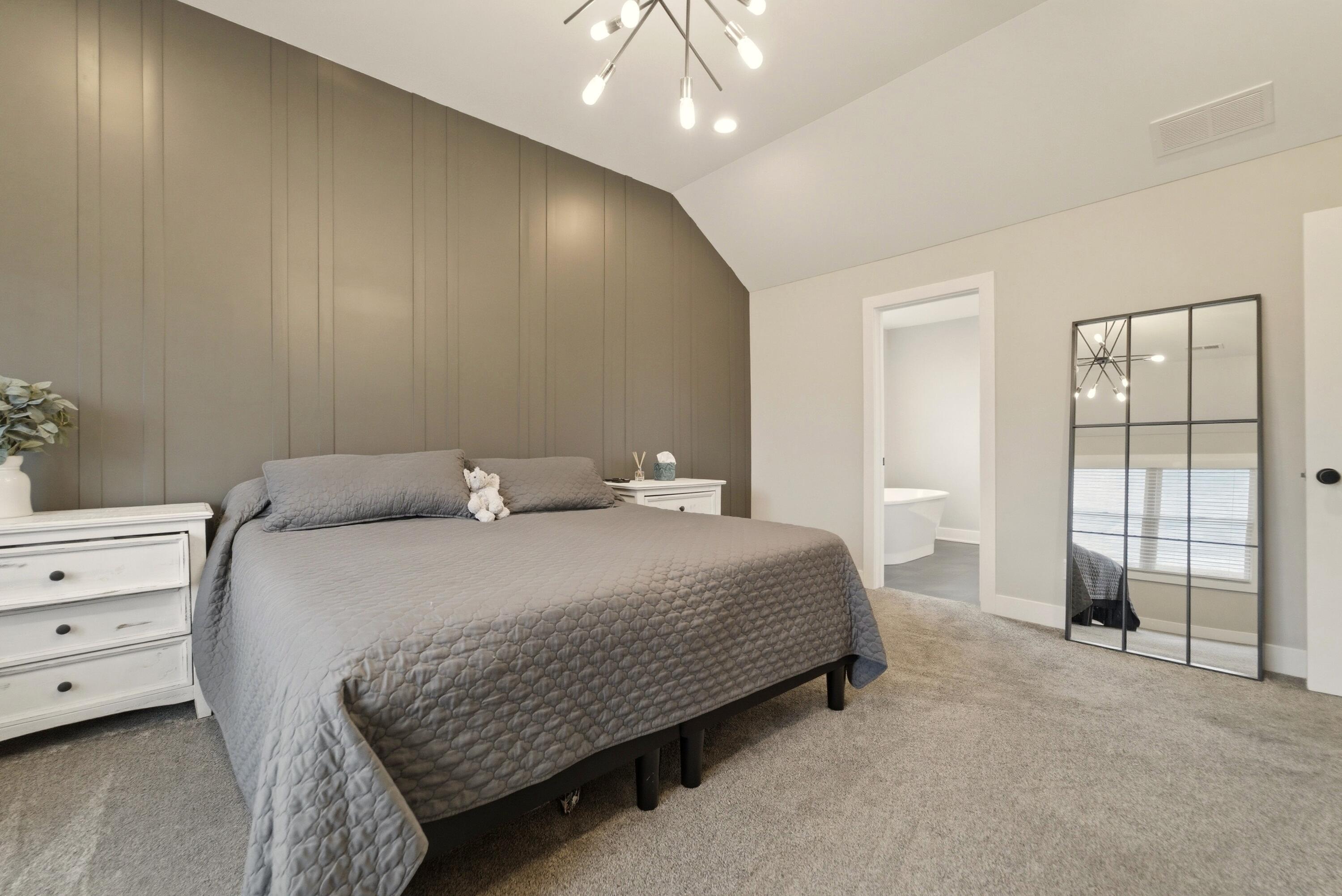 11200 Oak Ridge Court Crown Point, IN 46307 - Photo 25 of 43 a bedroom with a bed and window