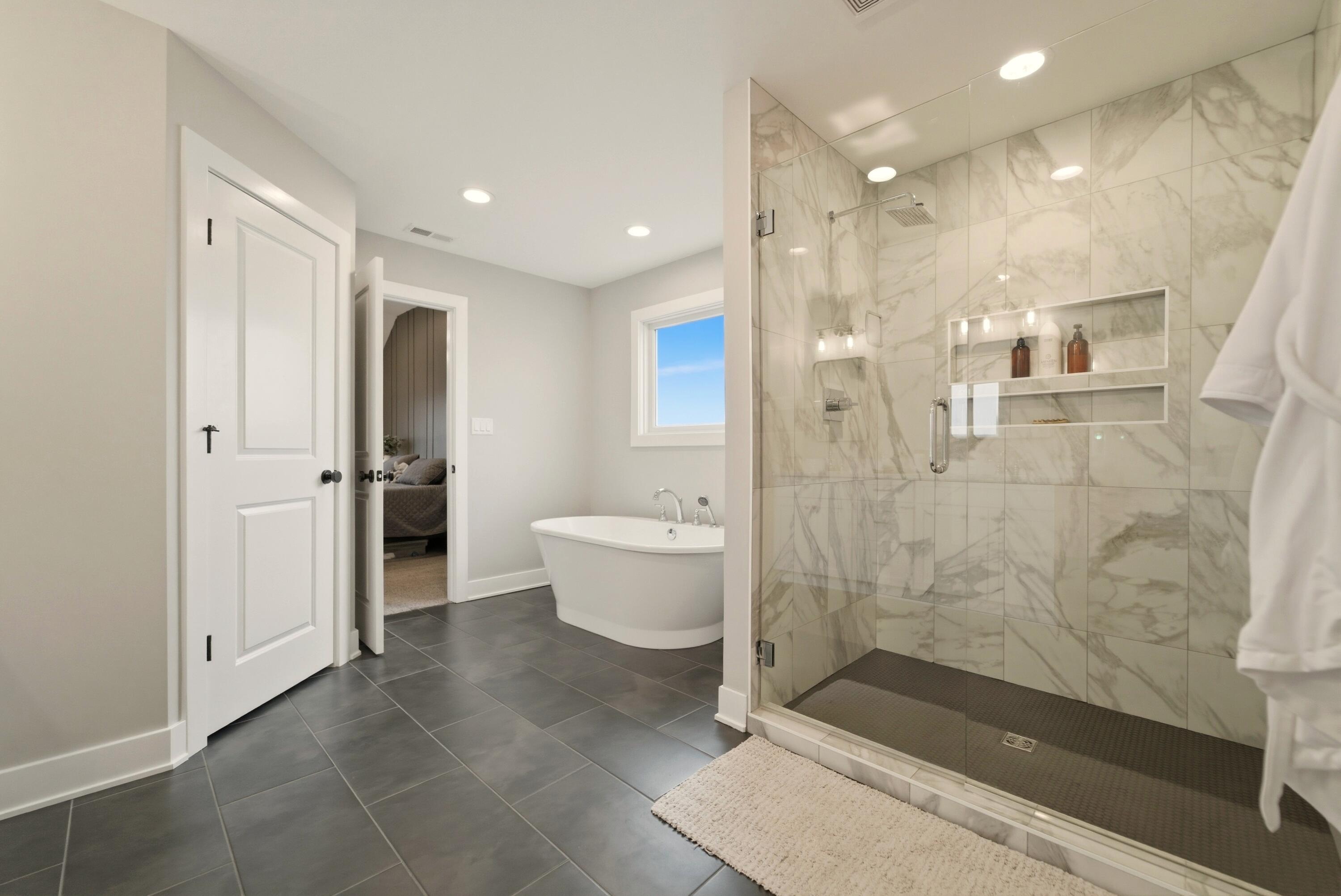 11200 Oak Ridge Court Crown Point, IN 46307 - Photo 28 of 43 a bathroom with a shower and a toilet