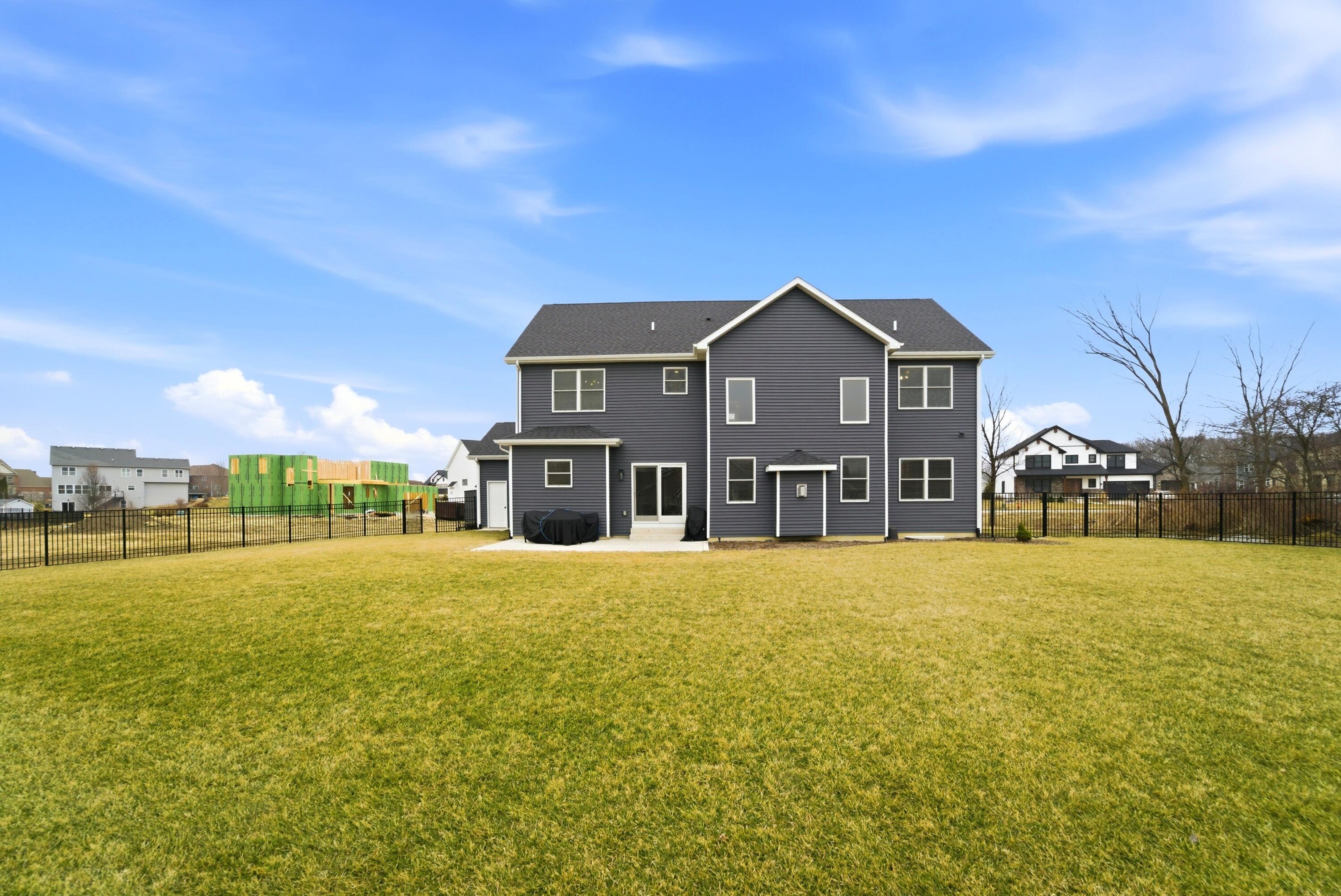 11200 Oak Ridge Court Crown Point, IN 46307 - Photo 38 of 43 a front view of a house with yard and ocean view