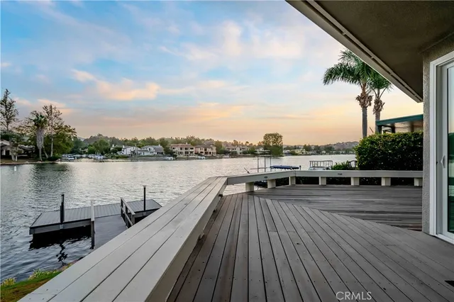 a view of a lake with sitting space