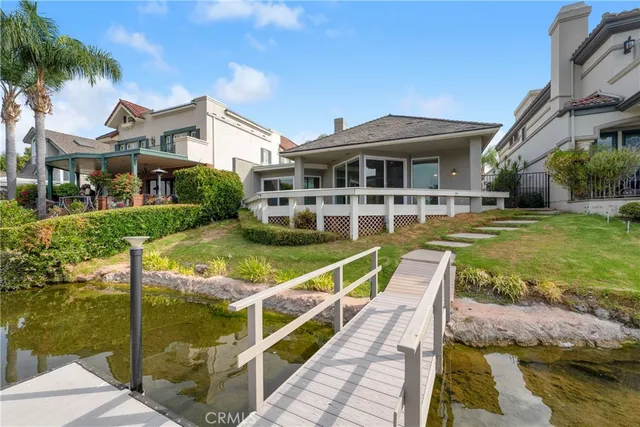 a view of a house with swimming pool