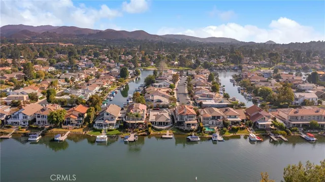 an aerial view of a town with couple of houses