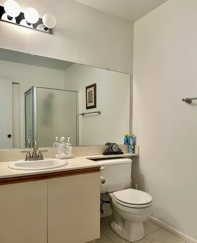 a kitchen with a sink stove and microwave