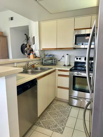 a view of a swimming pool with outdoor seating