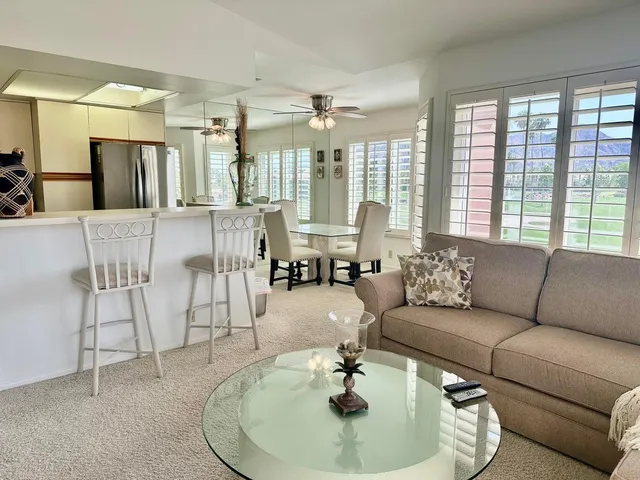a kitchen with a refrigerator stove and microwave