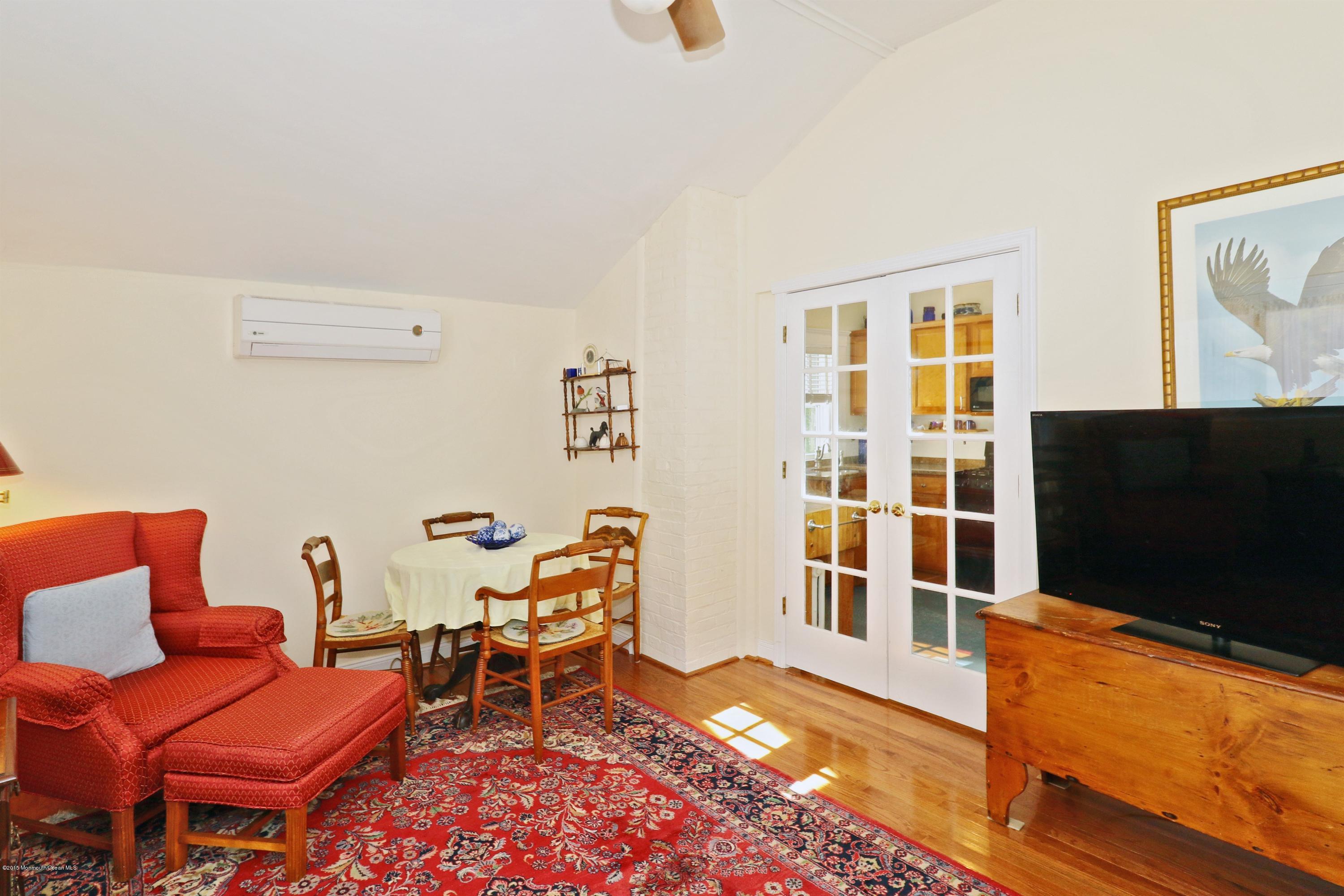 113 Rumson Road Little Silver, NJ 07739 - Photo 17 of 30 a living room with furniture and a flat screen tv