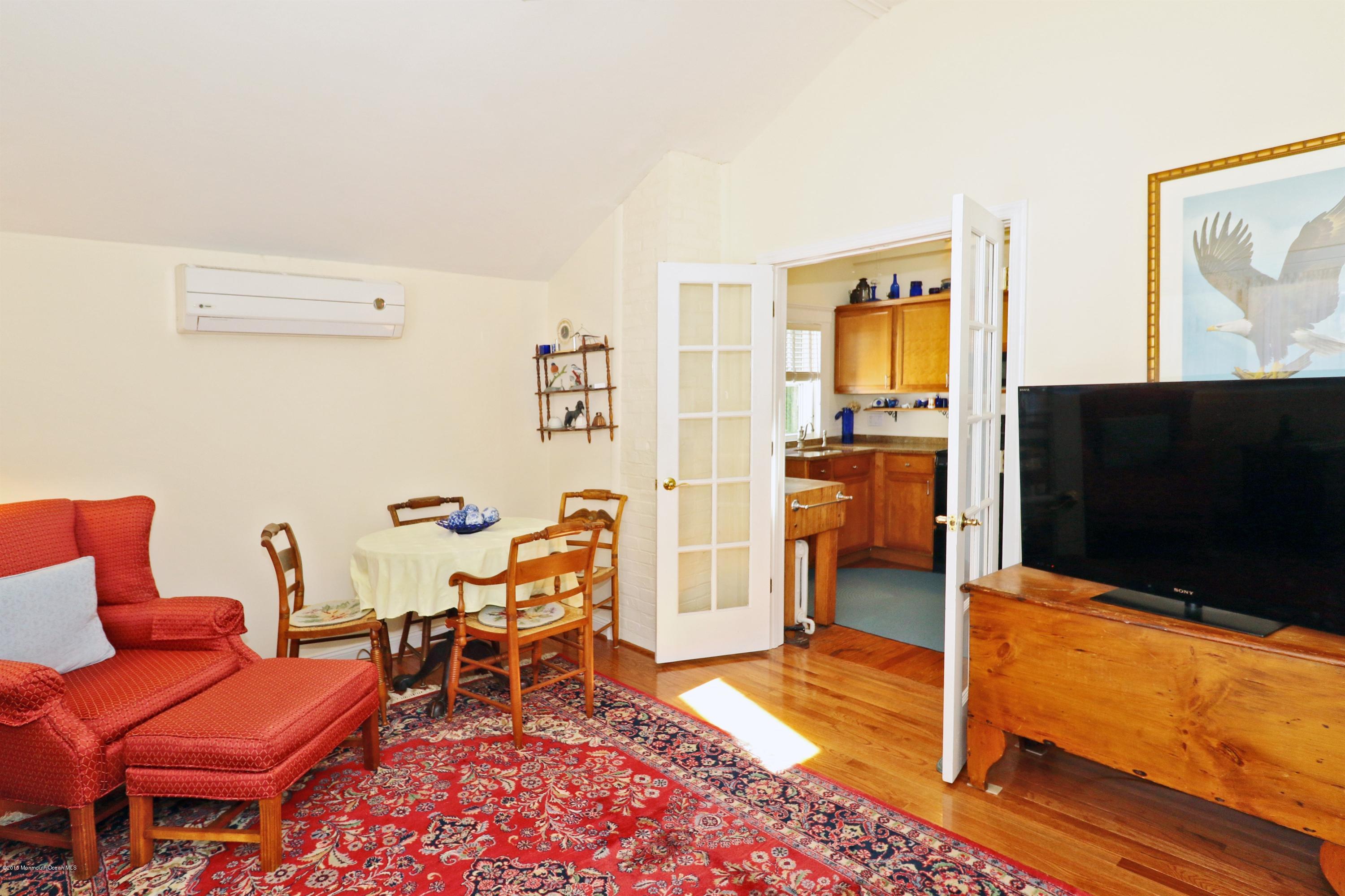 113 Rumson Road Little Silver, NJ 07739 - Photo 18 of 30 a living room with furniture and a flat screen tv