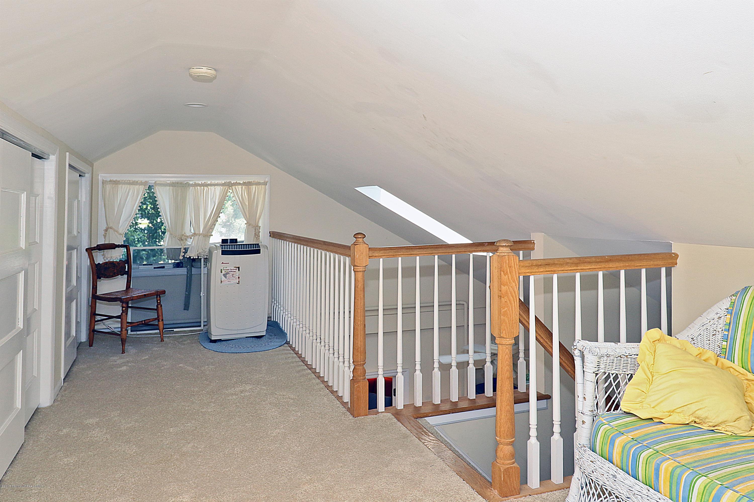 113 Rumson Road Little Silver, NJ 07739 - Photo 23 of 30 a view of a livingroom with furniture and staircase