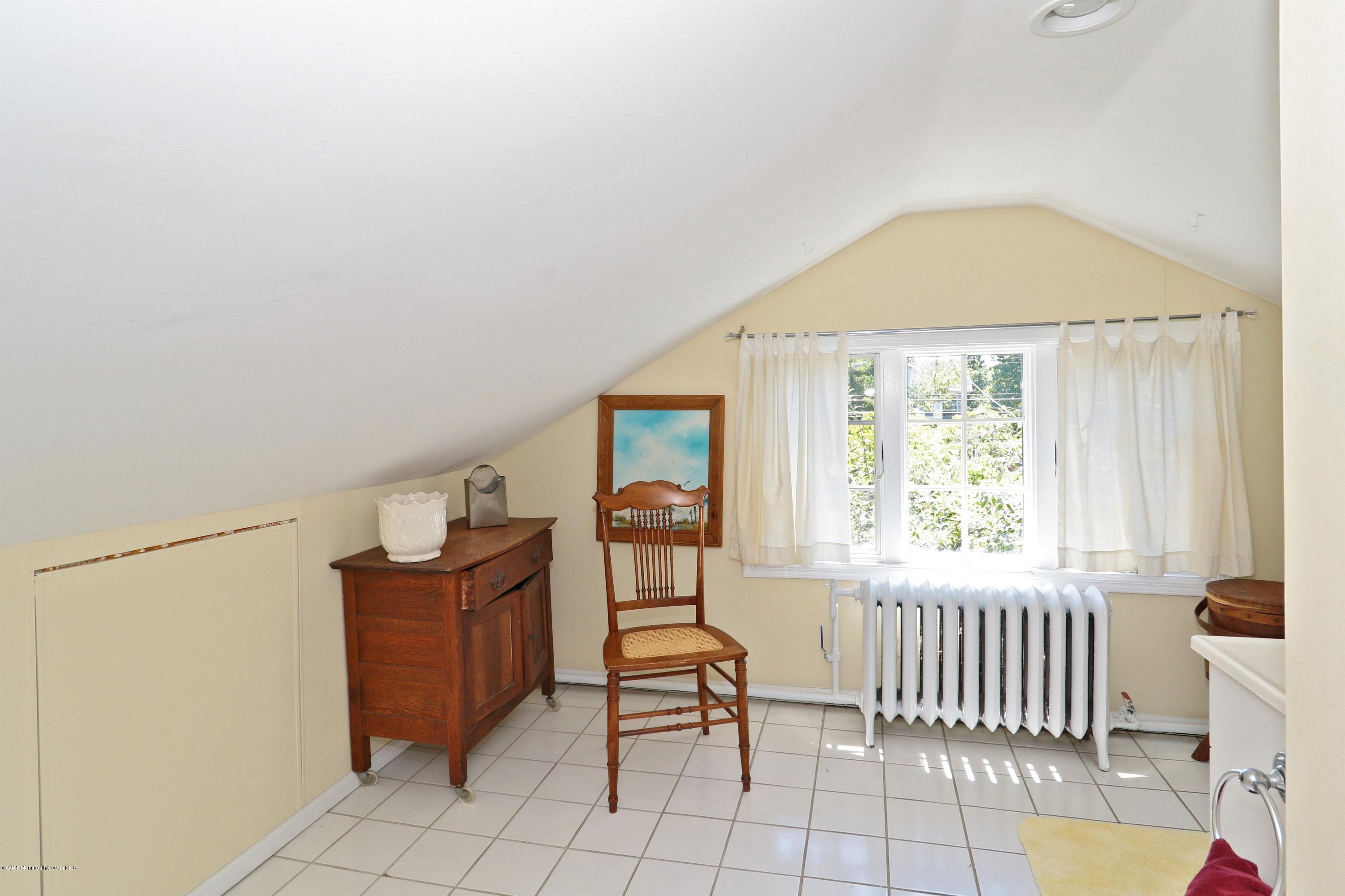113 Rumson Road Little Silver, NJ 07739 - Photo 24 of 30 a living room with furniture and a window
