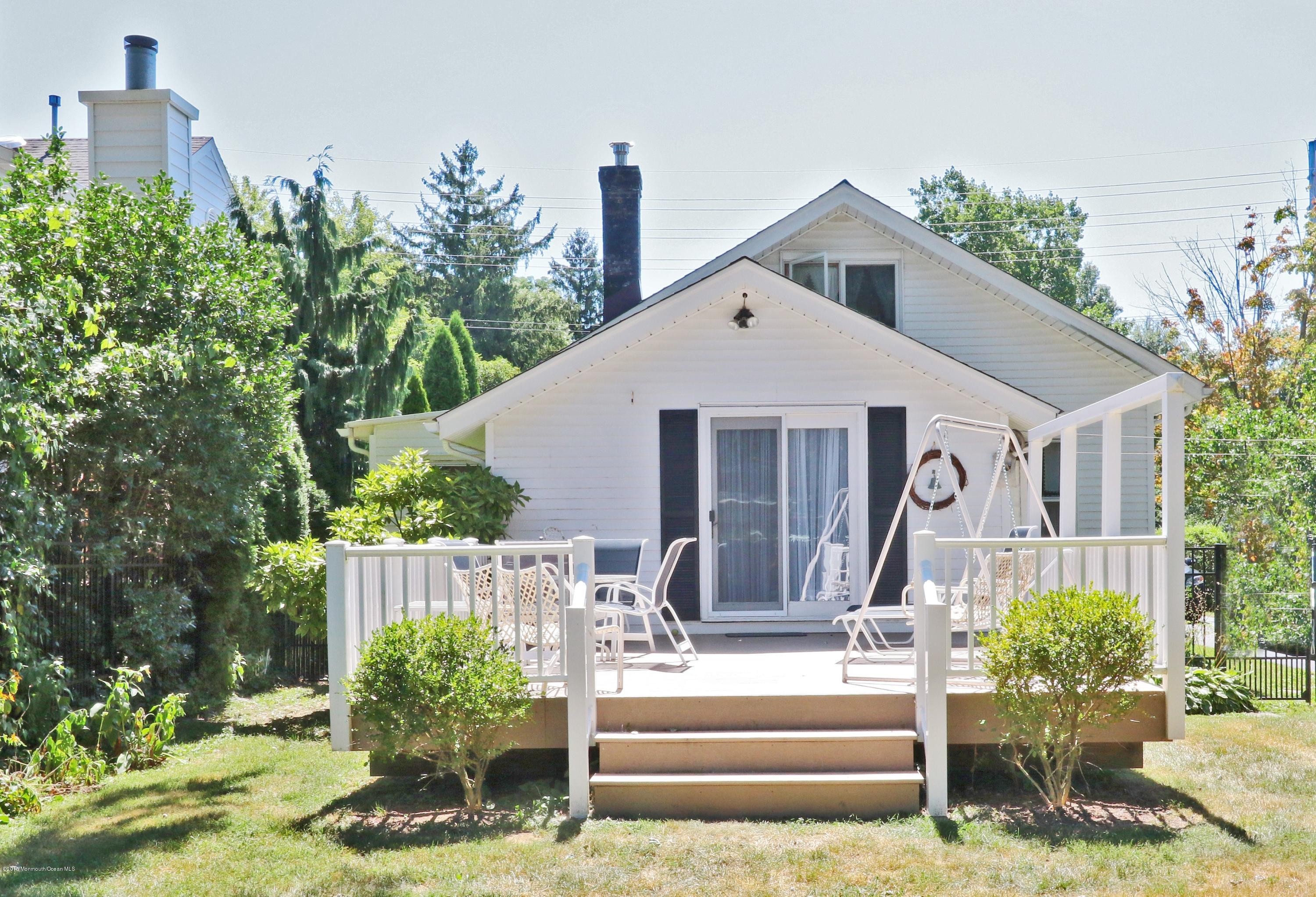 113 Rumson Road Little Silver, NJ 07739 - Photo 25 of 30 a front view of a house with a yard