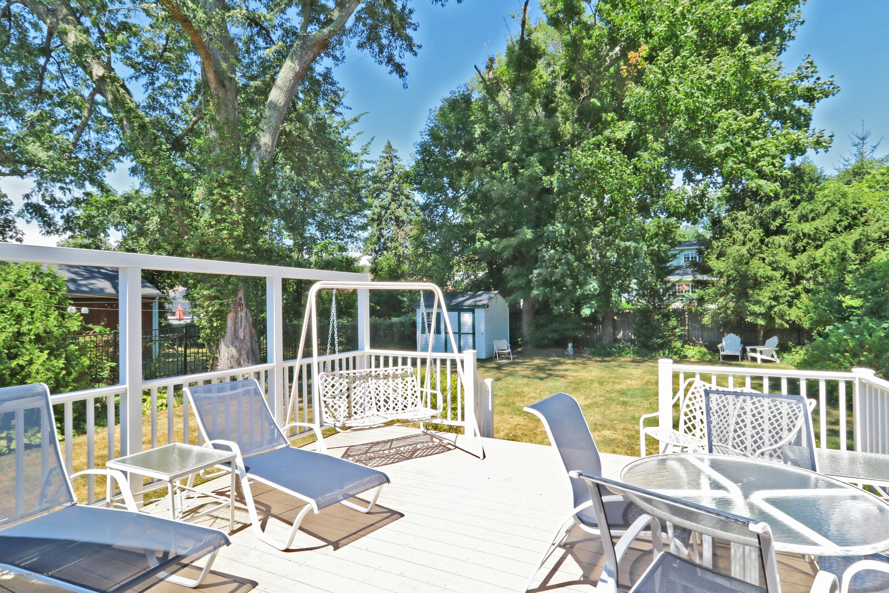 113 Rumson Road Little Silver, NJ 07739 - Photo 29 of 30 a view of a chair and table on the deck