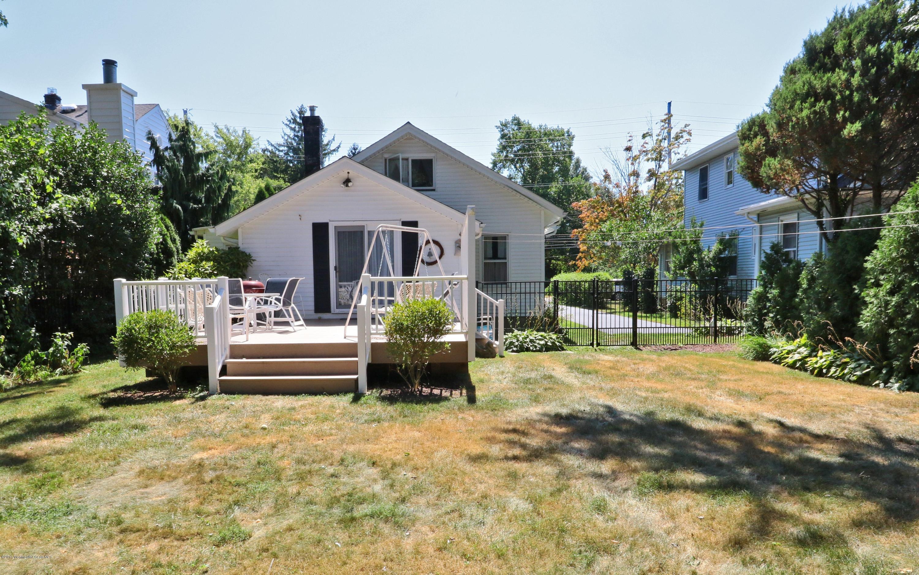 113 Rumson Road Little Silver, NJ 07739 - Photo 30 of 30 a front view of a house with a yard outdoor seating and mountain view