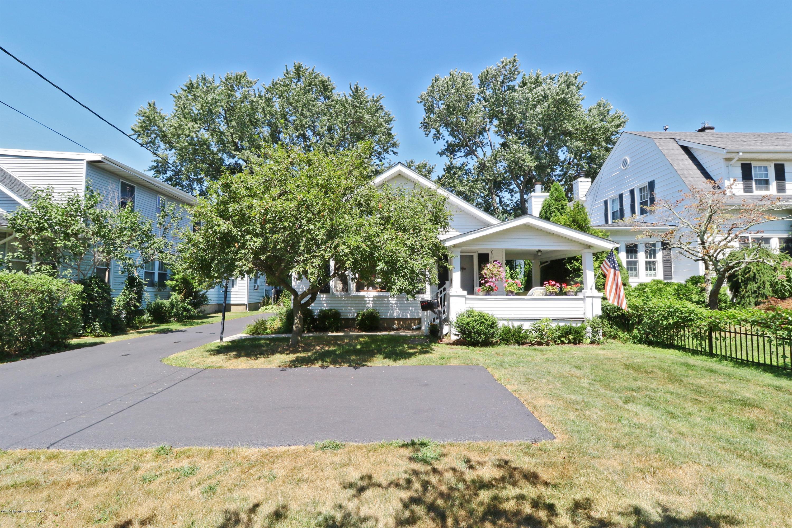 113 Rumson Road Little Silver, NJ 07739 - Photo 3 of 30 a front view of a house with a yard