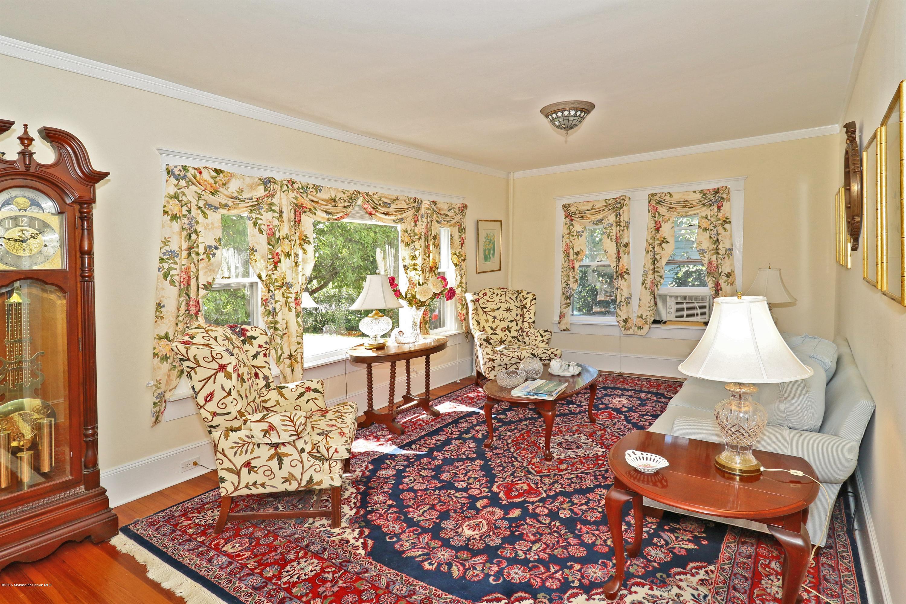 113 Rumson Road Little Silver, NJ 07739 - Photo 7 of 30 a living room with furniture and a window